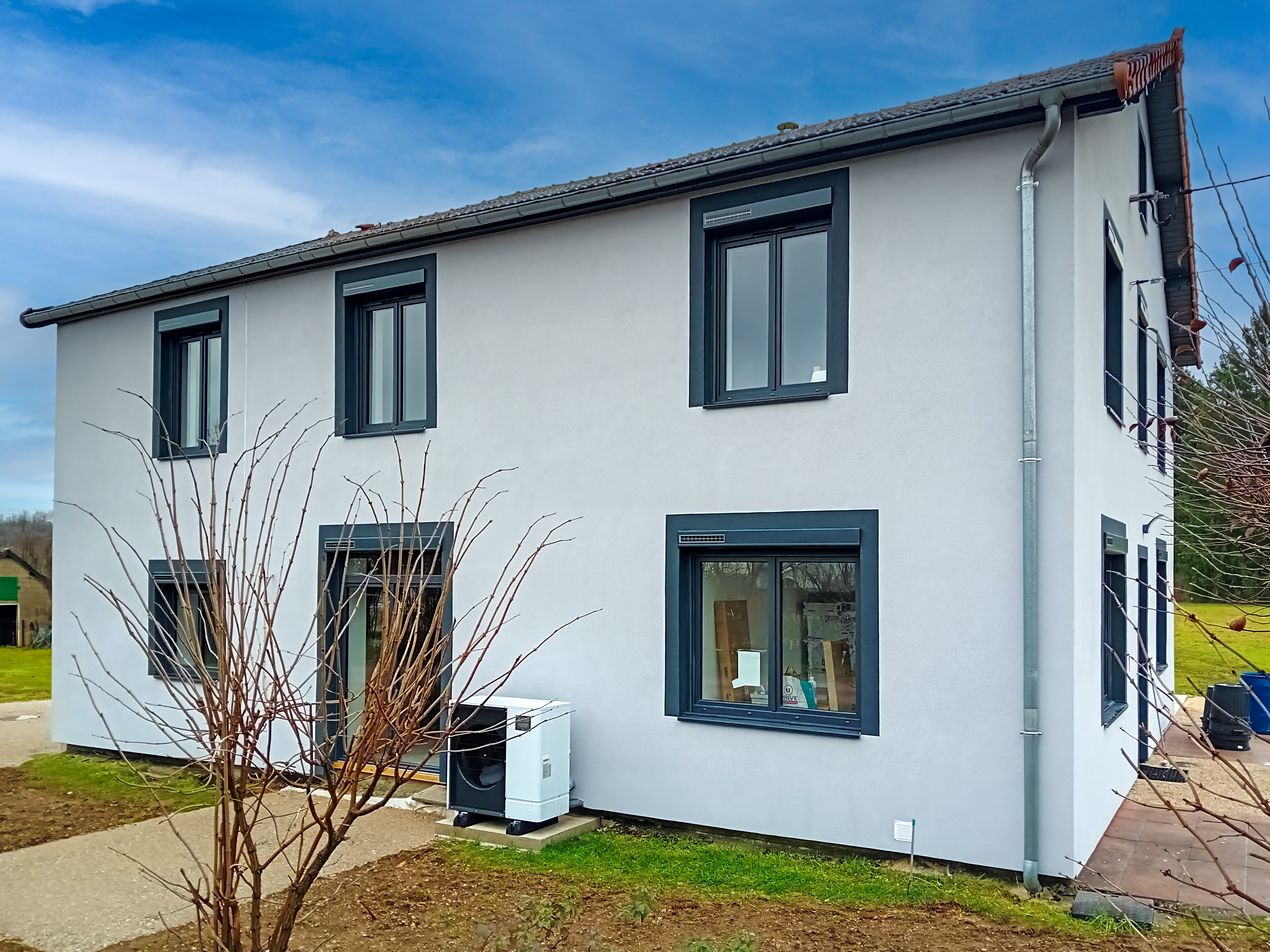 Rénovation énergétique globale : Isolation, ITE & Menuiseries pour un confort durable